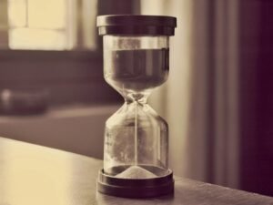 An hourglass counts down time.